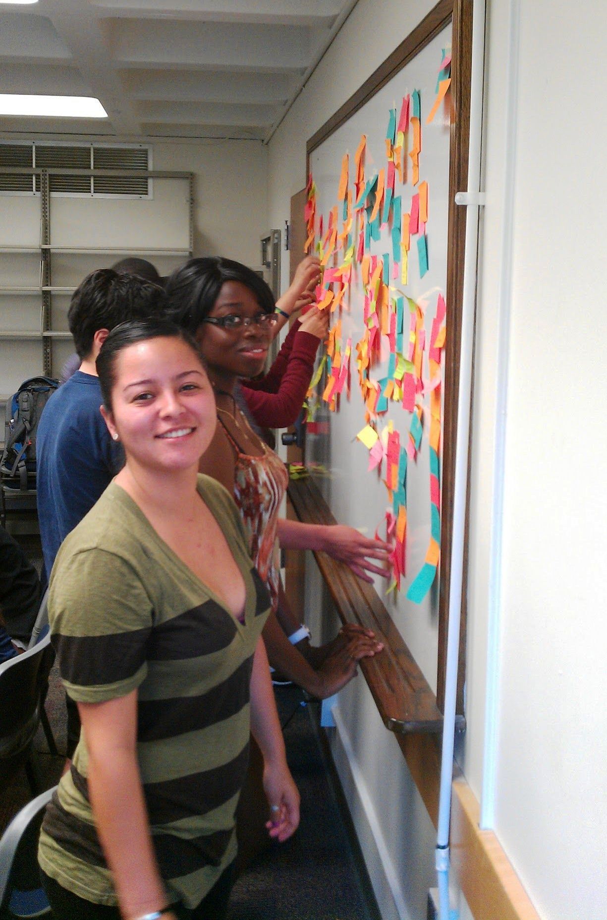 i3 Scholars--Guadalupe Soto and Amana Kaskazi--working together during a gaming workshop